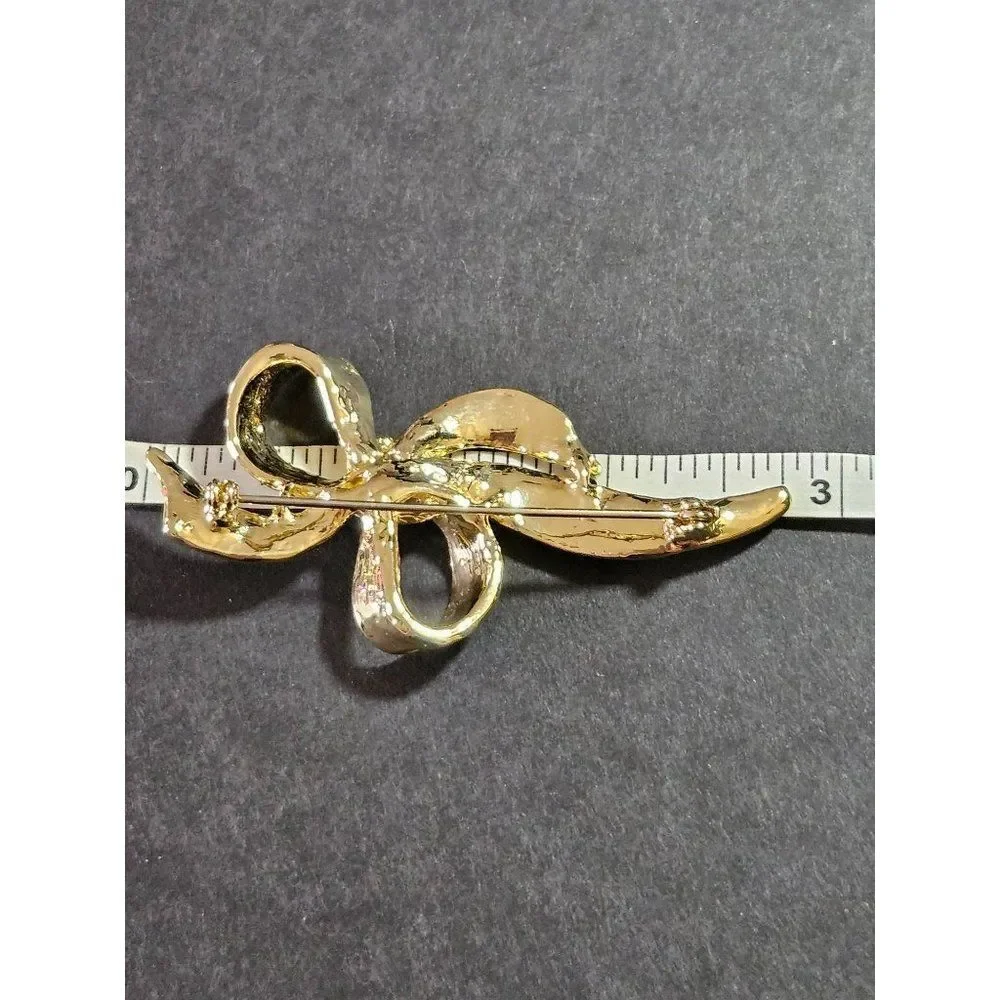 Vintage gold tone blue enamel bow brooch